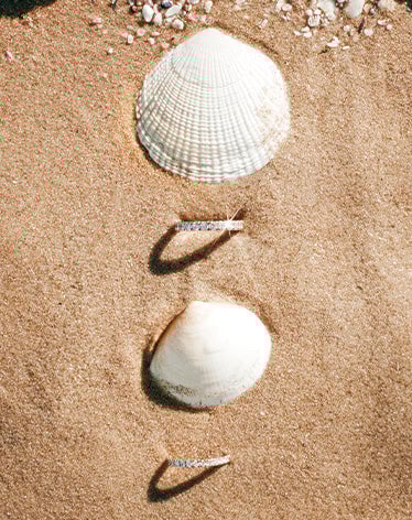 lab grown diamond rings and seashells